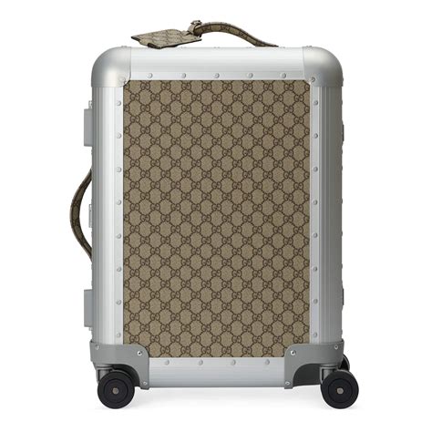 gucci heren kledinhg|Gucci luggage.